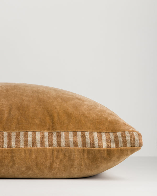Baya Edward cotton velvet box cushion in Butterscotch, side view showing the striped linen and cotton gusset