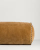 Baya Elliot cotton velvet bolster cushion in Butterscotch, close view of the velvet texture and striped piped end