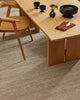 Baya Fairmont NZ Wool Floor Rug in Ash, close view under a dining table set with dark ceramics and a napkin