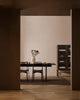 Baya Fairmont NZ Wool Floor Rug in Bracken, alternate wide view of the dining room with a glass-front cabinet