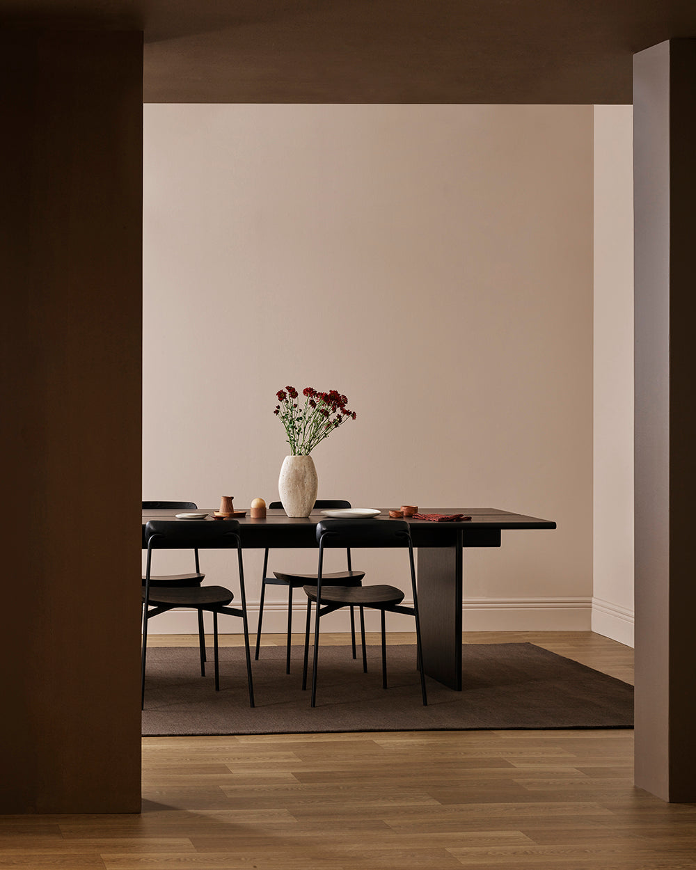 Baya Fairmont NZ Wool Floor Rug in Bracken, wide view of a dining room seen through a doorway