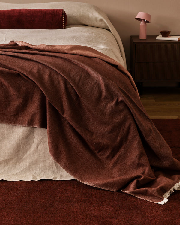 Baya Langford throw in raisin, close view of the brushed cotton weave and drape.