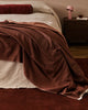 Baya Langford throw in raisin, close view of the brushed cotton weave and drape.