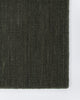 Corner detail of the Baya Linden Floor Rug in Petrol, showing the flatweave texture and finished fringed edge.