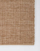 Baya Ormond outdoor rug in Biscotti, close view of a corner showing the flat-woven texture and edge.