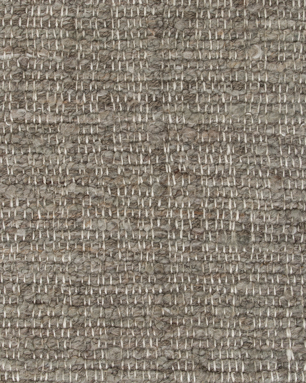 Baya Ormond outdoor rug in Mineral, close view of the woven texture in grey-brown and cream.