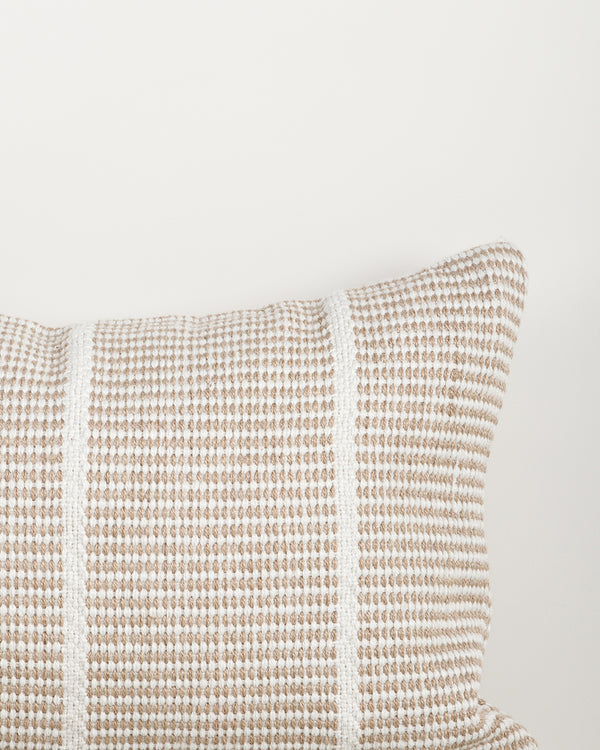 Close-up of the corner and weave texture on the Baya Shore outdoor lumbar cushion in Almond