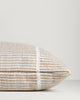 Close-up of the end seam and weave on the Baya Shore outdoor lumbar cushion in Almond