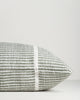Close-up of the end seam and weave on the Baya Shore outdoor lumbar cushion in Eucalyptus