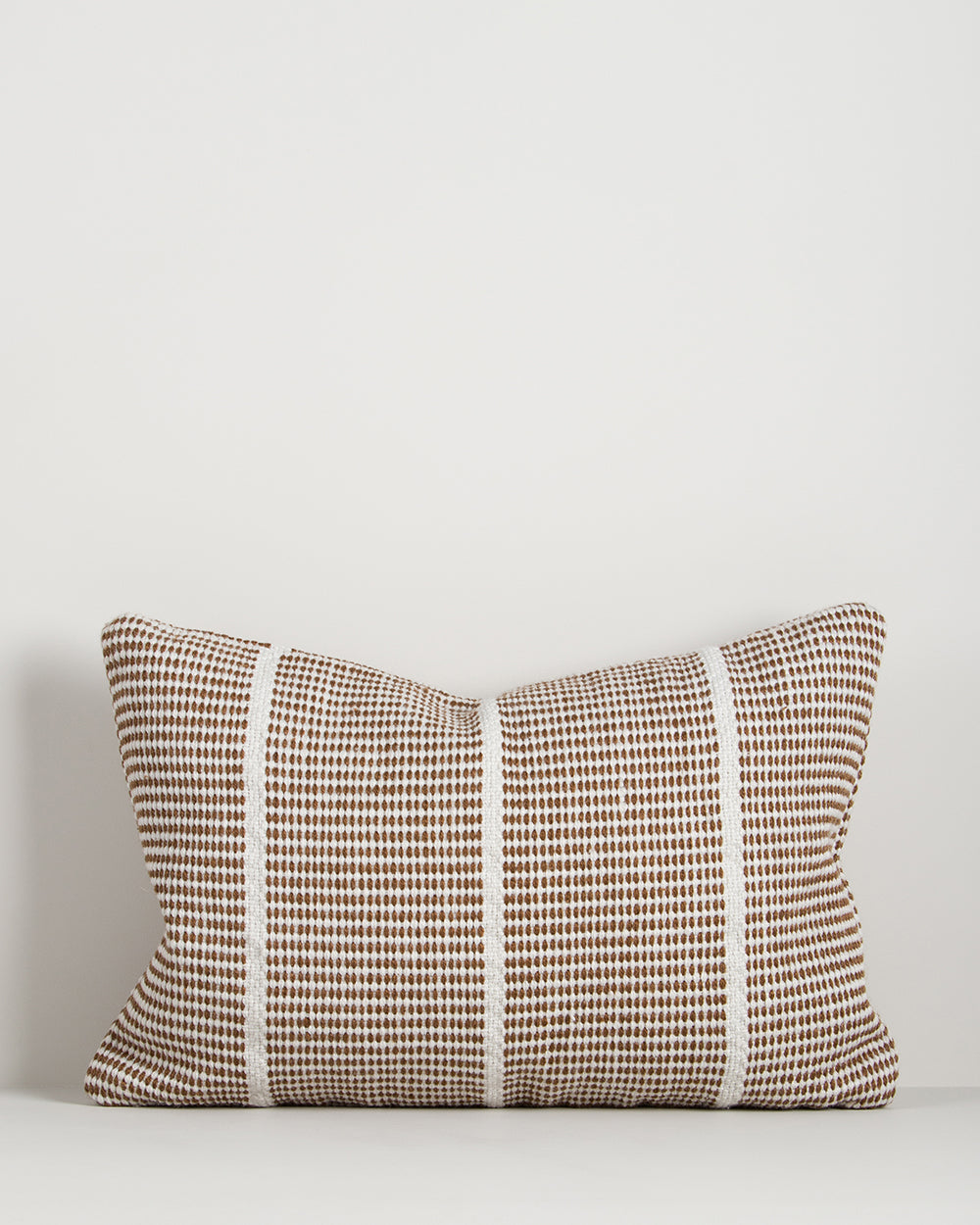 Baya Shore recycled PET outdoor lumbar cushion in Tobacco, full front view
