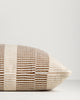 Baya Solar Outdoor Lumbar Cushion in Chocolate, close view of the end gusset and stripe weave.