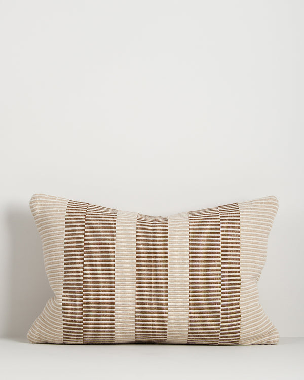 Baya Solar Outdoor Lumbar Cushion in Chocolate on a plain background, showing the brown and cream stripe weave.