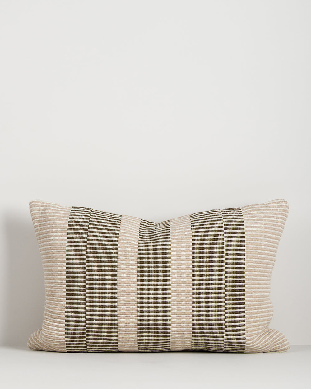 Baya Solar Outdoor Lumbar Cushion in Mangrove on a plain background, showing the linework weave.