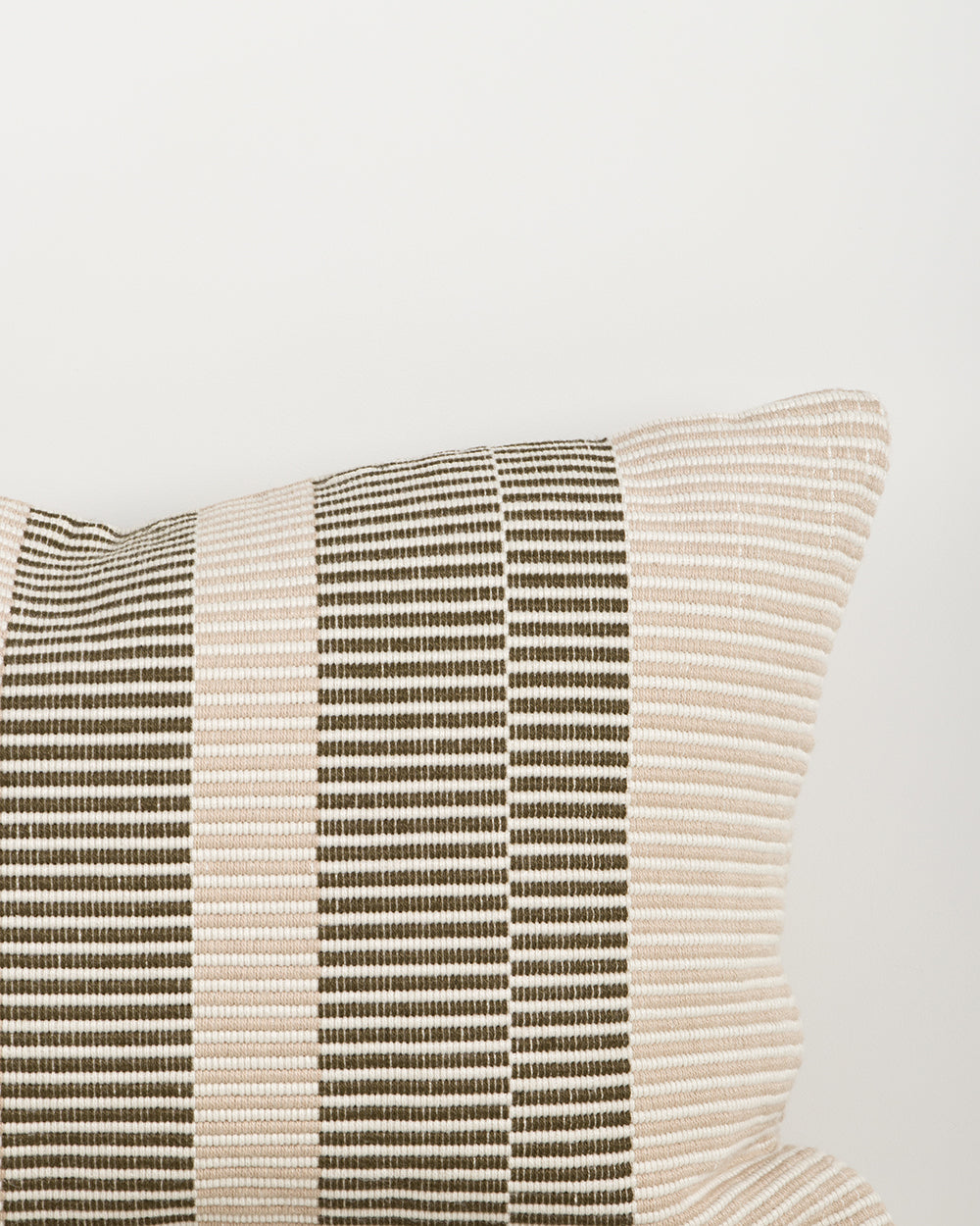Baya Solar Outdoor Lumbar Cushion in Mangrove, close view of the woven linework texture.
