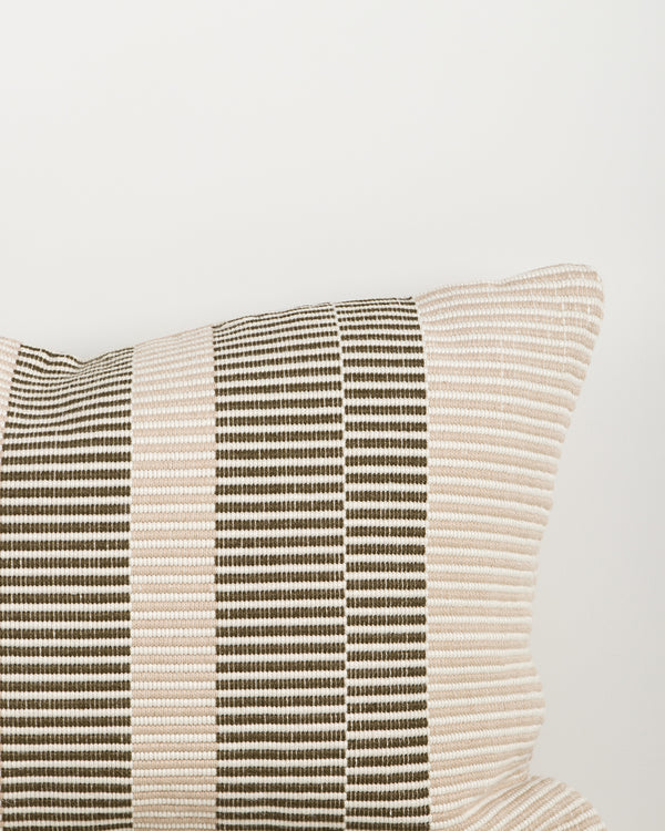 Baya Solar Outdoor Lumbar Cushion in Mangrove, close view of the woven linework texture.