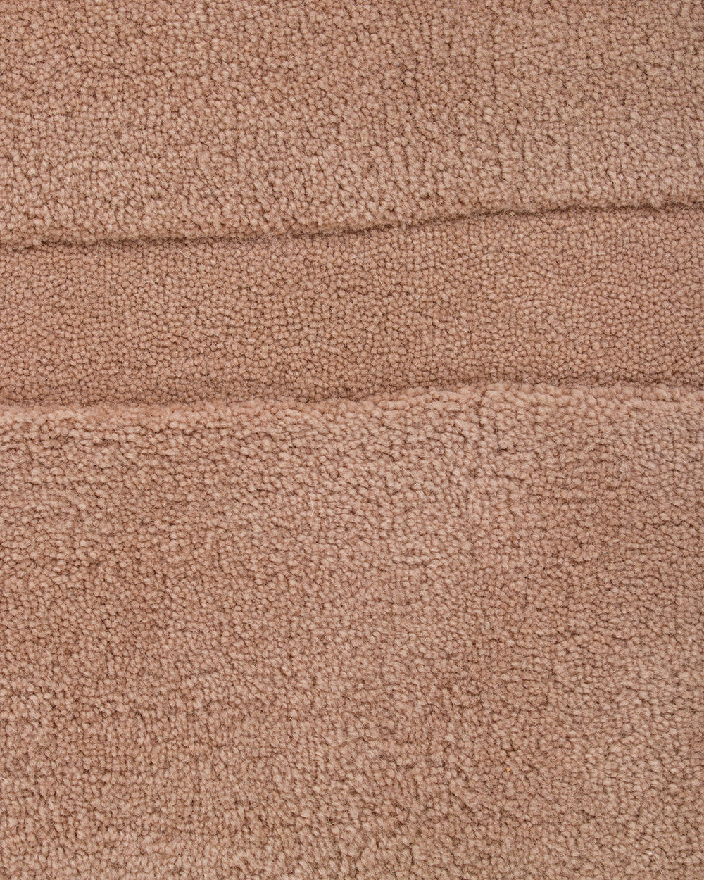 Baya Strata NZ wool floor rug in Clay, close view of the pile and a horizontal ridged line.