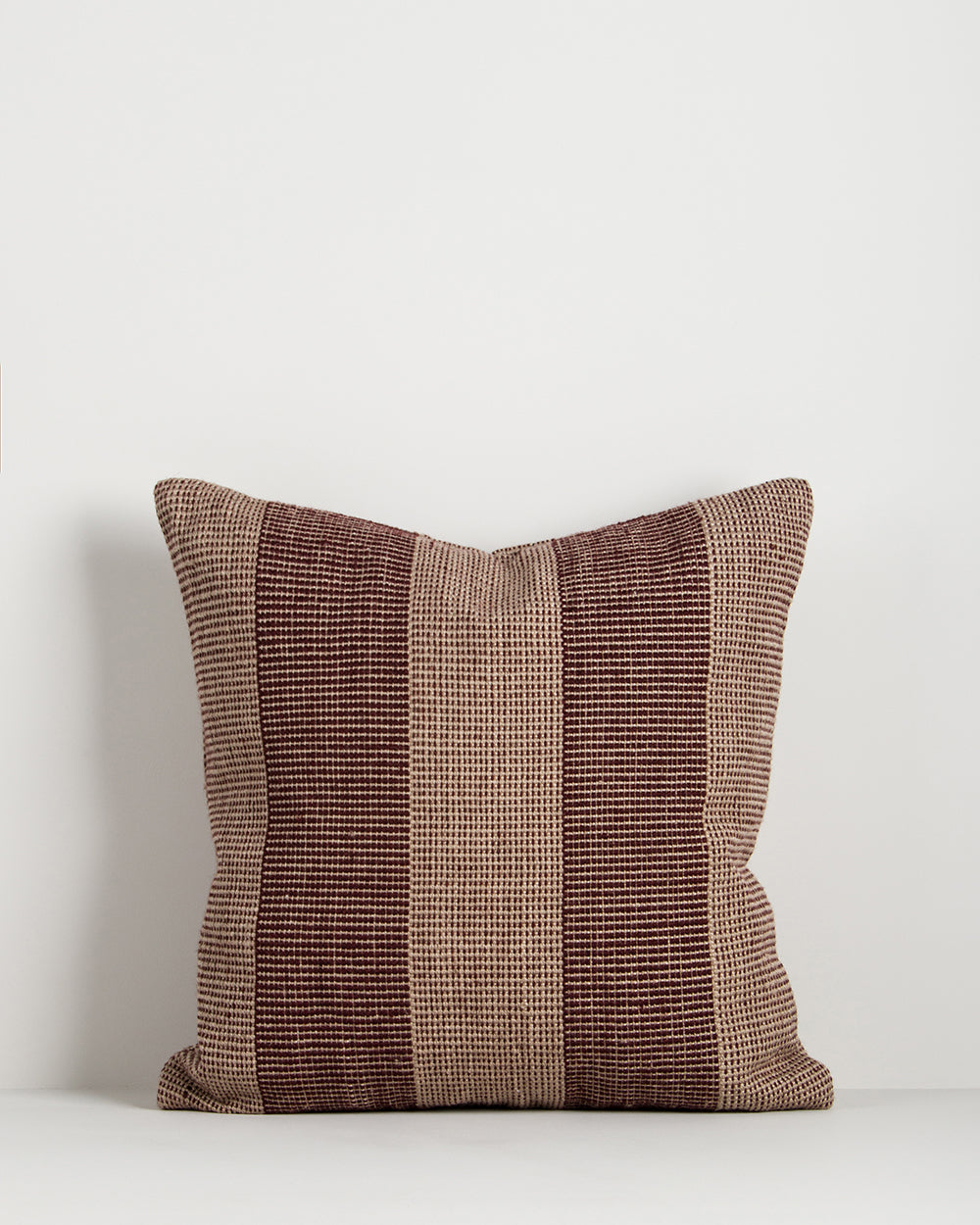 Baya Tide Recycled PET Outdoor Cushion in Claret, shown flat on a plain background.