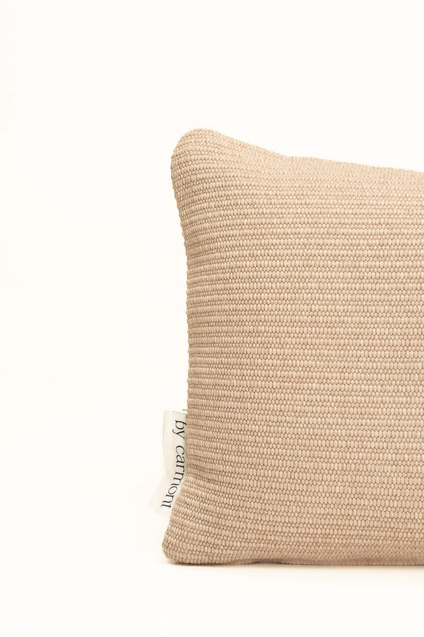 By Carmont Leroy cushion cover in Cameo, corner close-up showing the woven texture and brand label