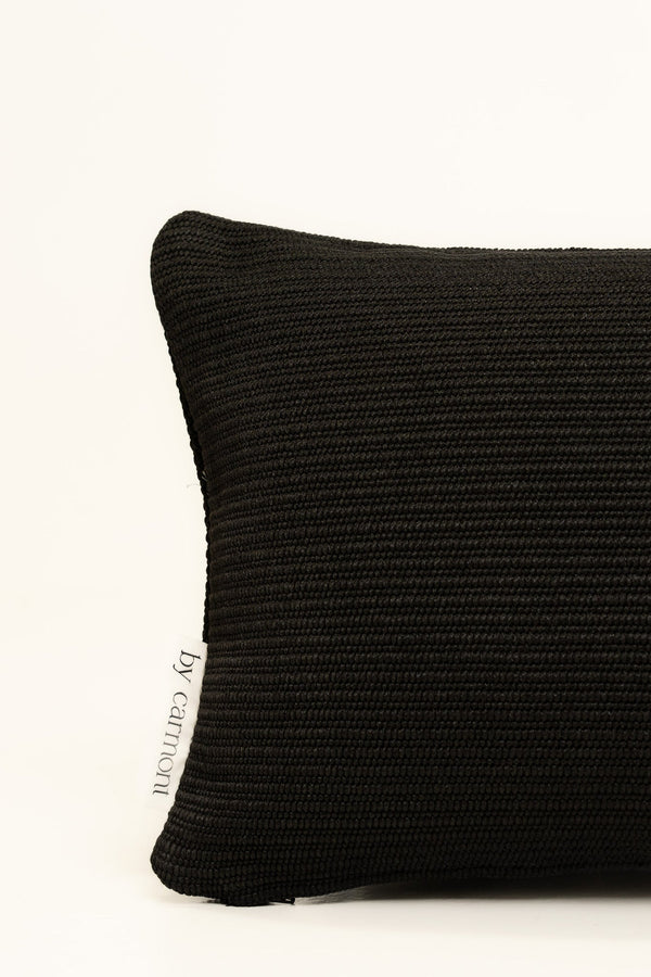 By Carmont Leroy cushion cover in Sable, corner close-up showing the woven texture and brand label