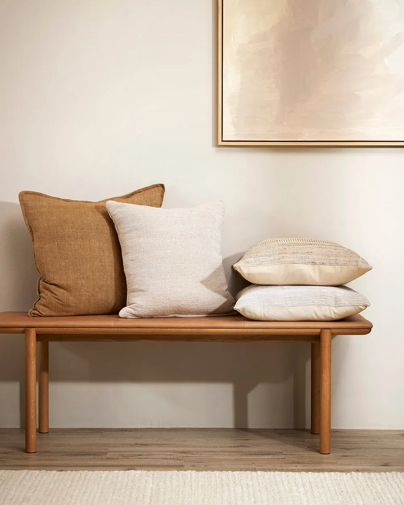 Baya linen cushions featuring the contemporary tone cumin brown