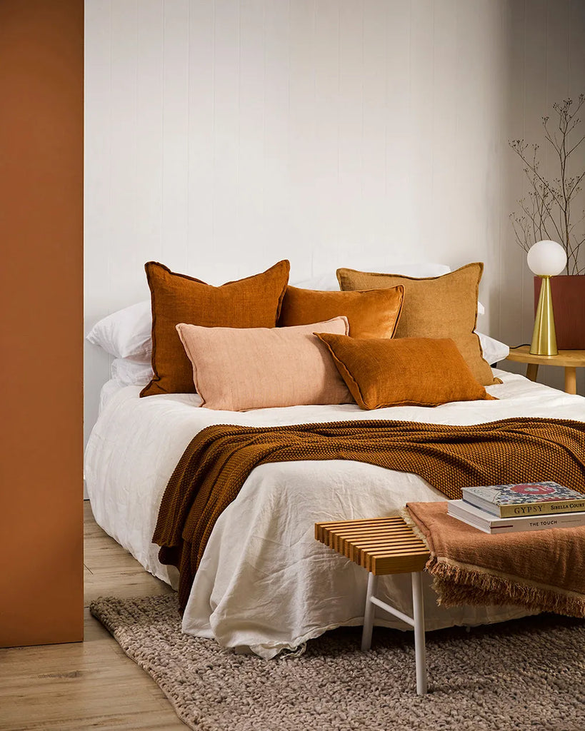 Brown Baya cushions in a contemporary bedroom