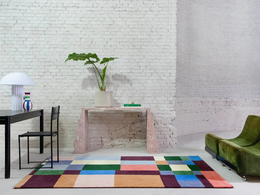 The Beat rug by Brink & Campman - a bold geometric design in striking colours, seen in a contemporary living spacee.