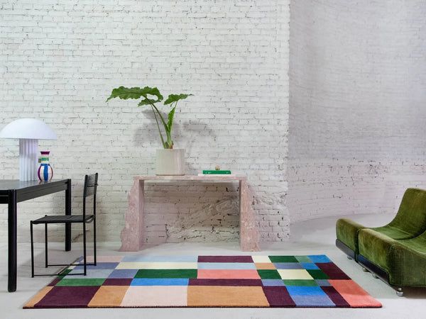 The Beat rug by Brink & Campman - a bold geometric design in striking colours, seen in a contemporary living spacee.