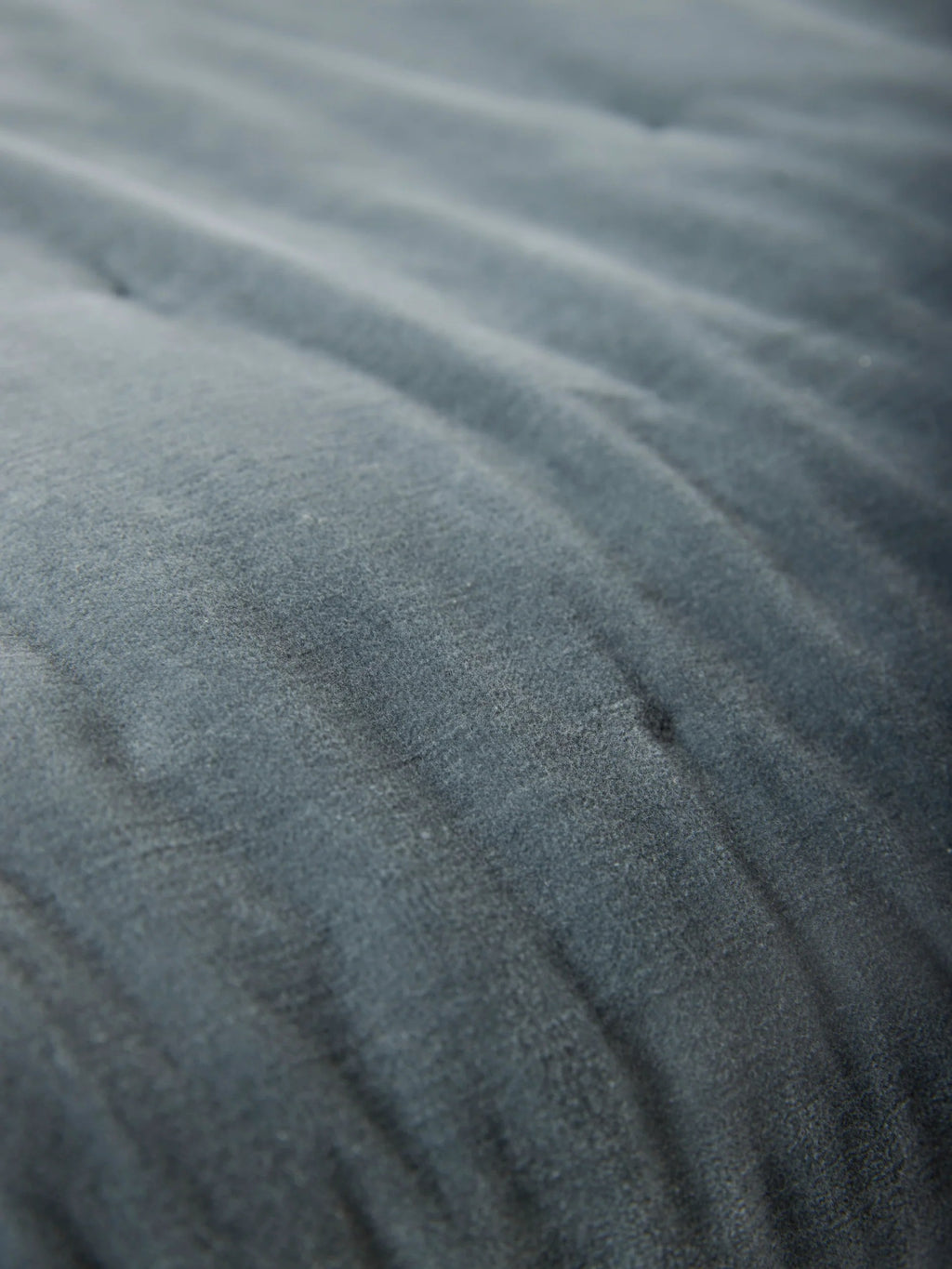 Close view of the soft cotton velvet pile on the Città Cotton Velvet Quilt in Cod