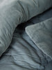 Città Cotton Velvet Quilt in Cod, showing its quilted channels and velvet surface