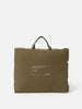Città Cotton Velvet Quilt in Ivy in its zipped cotton storage bag