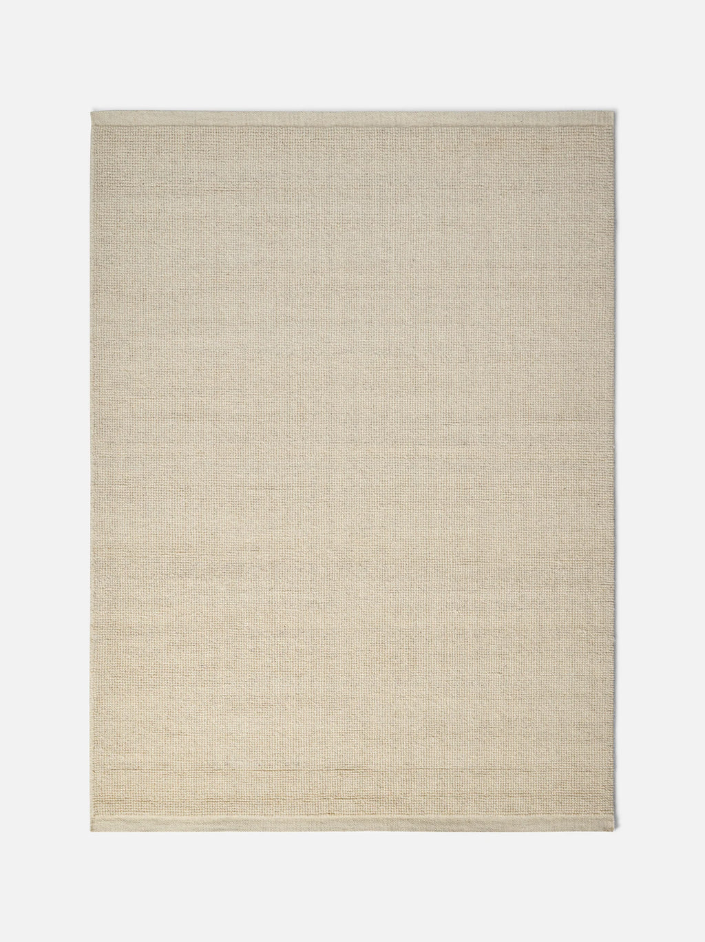 Città Joni Wool Mat in Oatmeal, full flat lay view of the mat.
