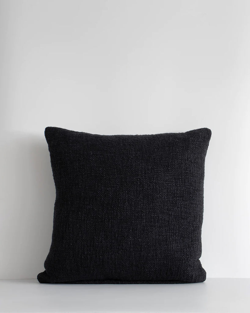 Black cyprian textural weave cushion by Baya