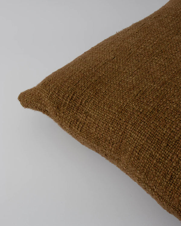 Close up of the textural weave of the Baya cyprian cushion