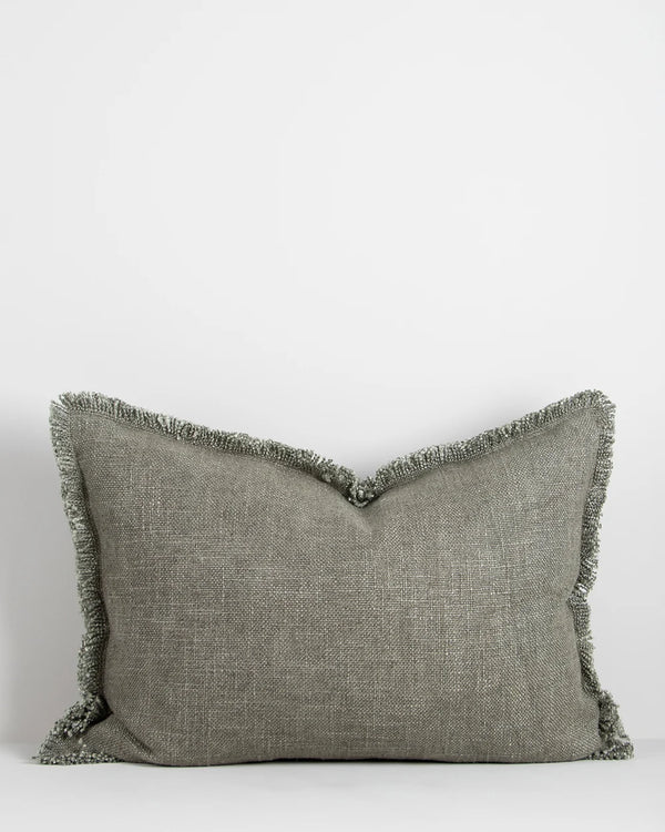 Sage green lumbar cushion with soft fringed detail surround, by Baya nz