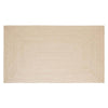 Full view of a braided rug by Globe West and Soren Liv NZ in natural beige tones, perfect for outdoors or transition spaces. 