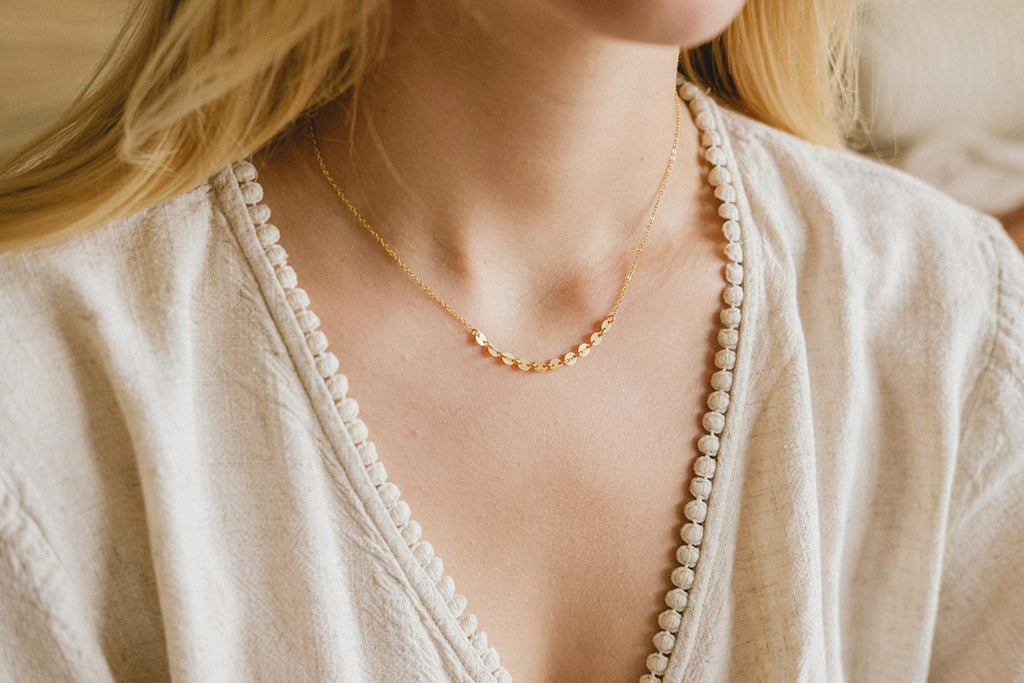 A beautiful yellow gold necklace, intricate and delicate. 