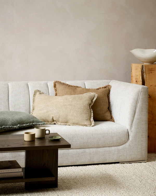 Brown coloured lumbar cushions with soft fringe detail, by Baya nz