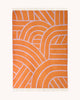 A full view of the reverse side of the Maison Deux NZ wool throw blanket with a lined pattern, in shades of mostly orange with pale purple detailing.