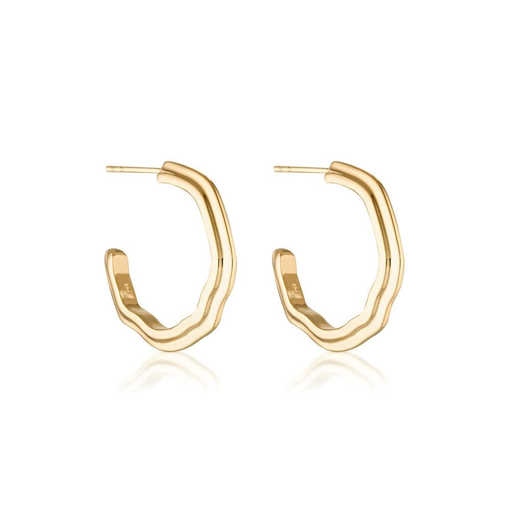 Two chunky hoop earrings with sculptural details in 14k gold-plate.