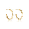 Two chunky hoop earrings with sculptural details in 14k gold-plate.