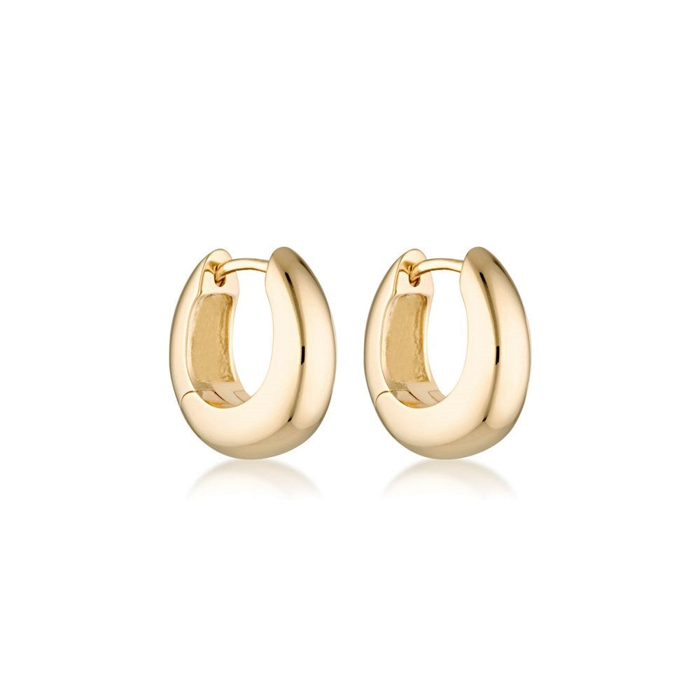 A pair of chunky gold plated huggie hoop earrings. 