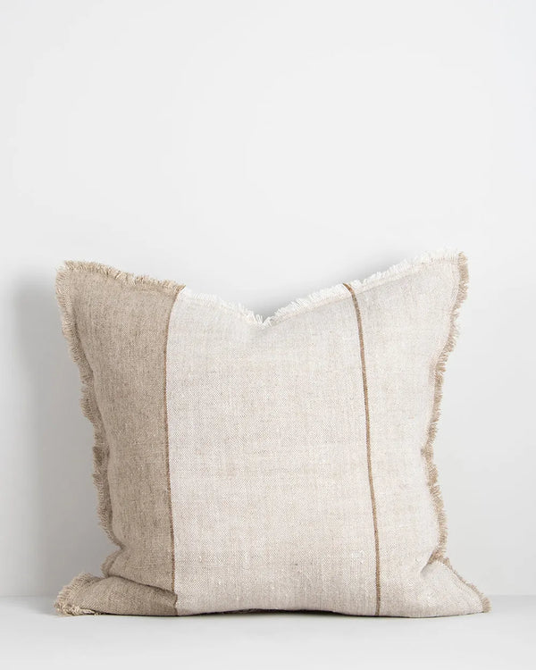 A natural linen cushion with a sand-coloured stripe and fringed edge detail