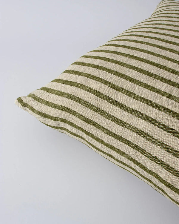 Corner close up of the Baya striped linen 'Spencer' cushion in natural linen and khaki stripe 