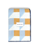 Maison Deux Cubics wool throw in Blue Honey, folded to show the cube pattern and the woven Maison Deux label