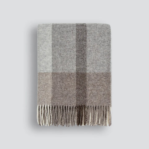 Baya NZ wool throw blanket in a modern brown and grey neutral plaid