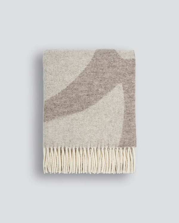 NZ wool throw blanket in soft beige taupe brown pattern, with cream fringe tassles
