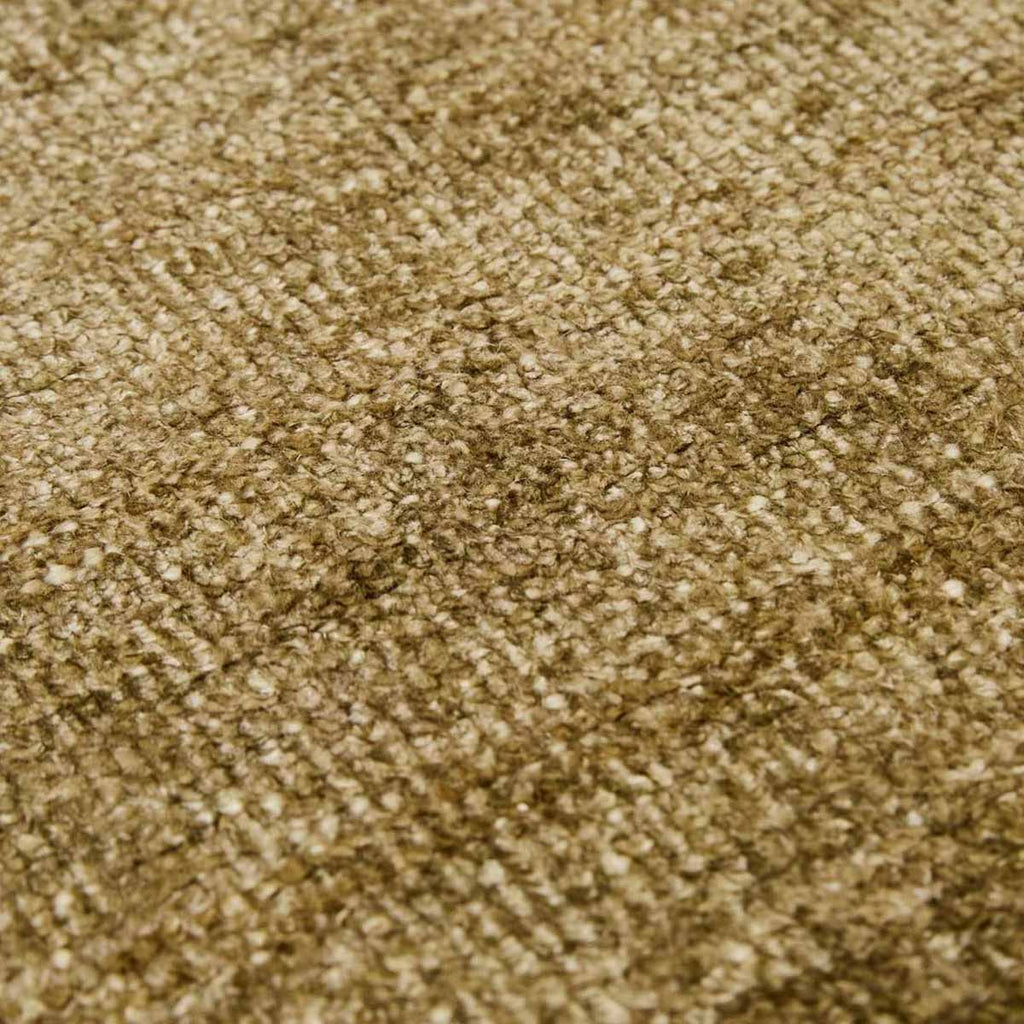 Close up of the weave of a soft, wool blend rug in shades of muted olive green by Soren Liv NZ and Globe West.