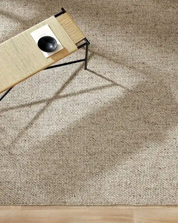 The Baya woven textural floor rug 'Omaha' in colour 'Pebble' seen from above
