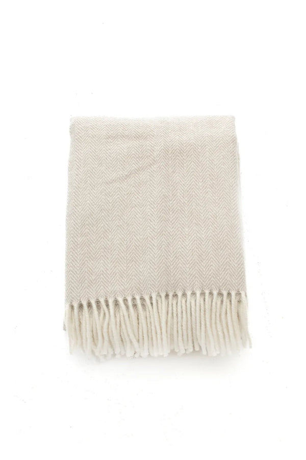 Palliser Ridge Herringbone throw in Fawn folded flat, showing the herringbone weave