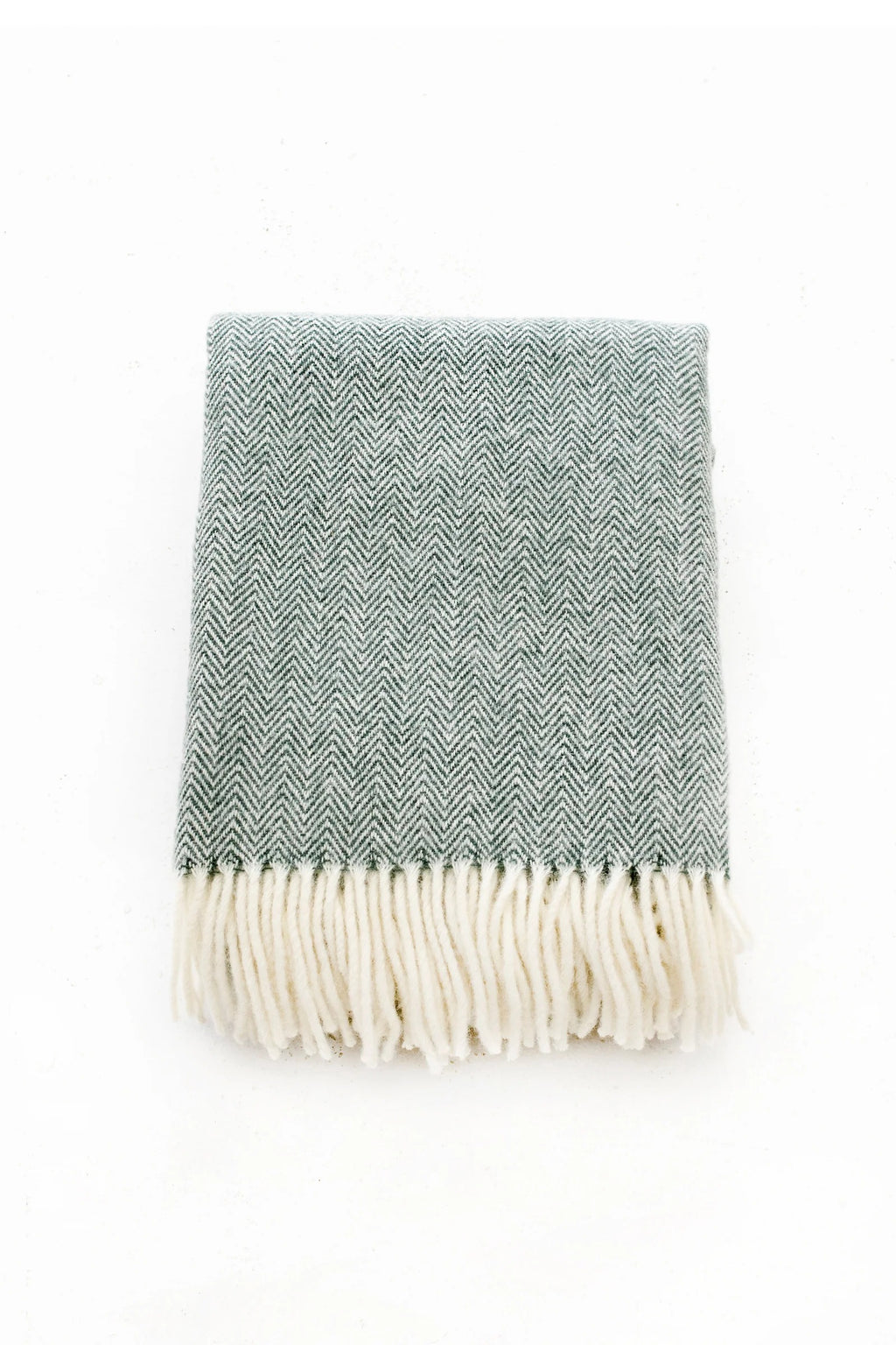 Palliser Ridge Herringbone throw in Forest folded flat, showing the herringbone weave